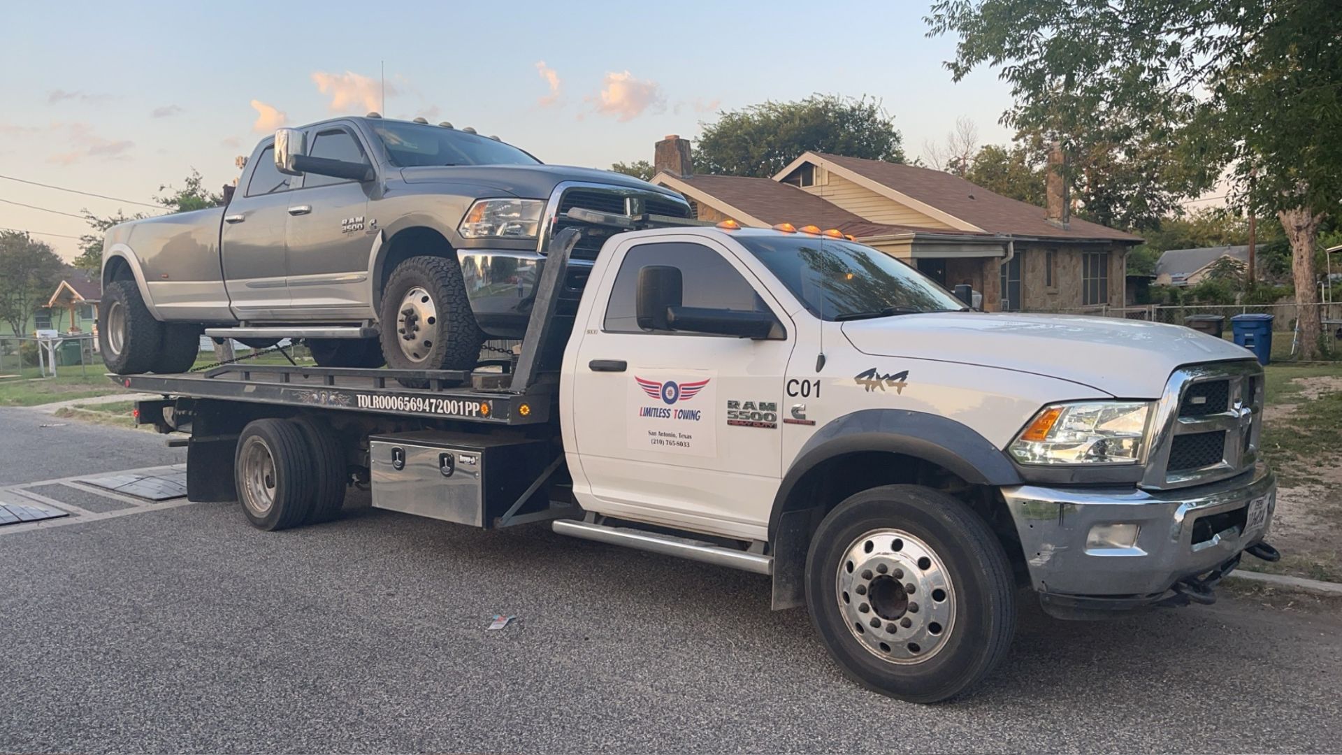 A truck with a flat bed on the back of it